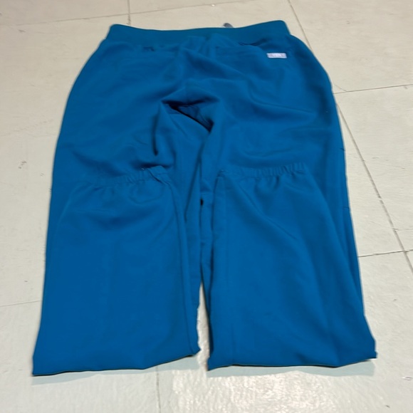 Figs I believe the color is pacific blue scrubs top and bottom are XXS. - Picture 4 of 7